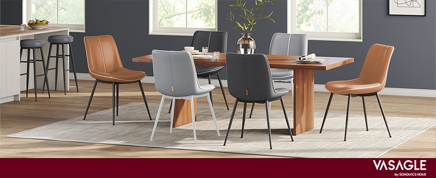 鐵藝皮革餐椅線條簡潔，深棕色人工皮革椅搭配餐桌打造工業風餐廳空間